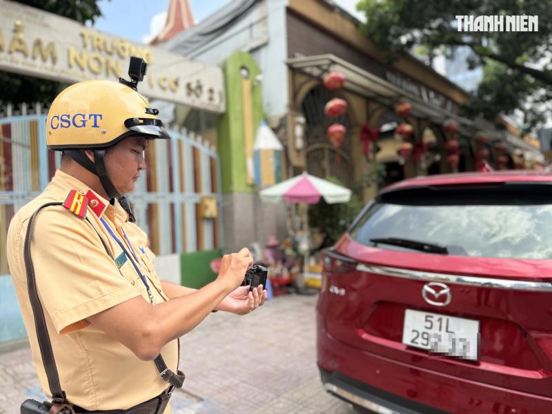 CSGT ghi hình phạt nguội: Nhiều tài xế bất ngờ vì mắc lỗi tưởng… không sao - Ảnh 1.