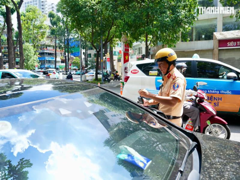 Quán cà phê che biển số xe đỗ sai cho khách: CSGT nói gì? - Ảnh 3.