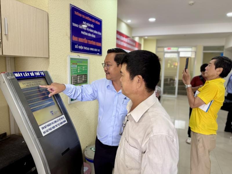 - Ảnh 2. TP.HCM: Người dân hài lòng sau 10 ngày vận hành chính quyền địa phương 2 cấp - Ảnh 2.