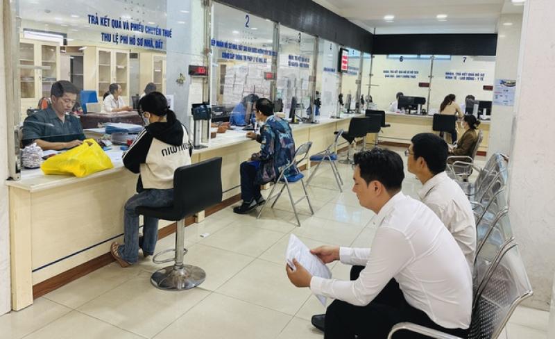 - Ảnh 1. TP.HCM: Người dân hài lòng sau 10 ngày vận hành chính quyền địa phương 2 cấp - Ảnh 1.