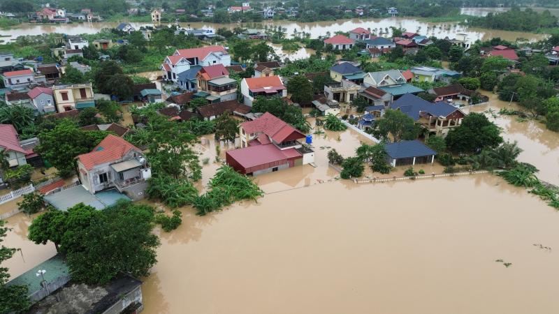 Hình ảnh hàng ngàn ngôi nhà ở Thanh Hóa ngập trong nước lũ - Ảnh 13.
