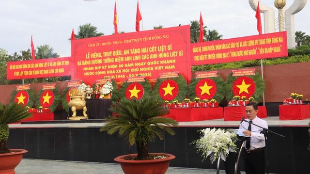 Truy điệu, an táng 30 hài cốt liệt sĩ tìm thấy ở sân bay Lộc Ninh- Ảnh 1.