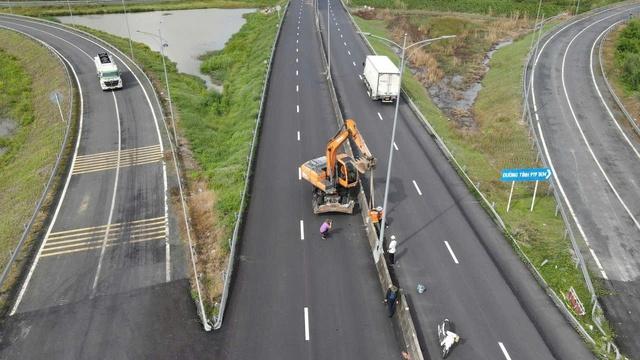 Đường 'ổ gà' thành cao tốc huyết mạch ĐBSCL, xe chạy bon bon 90 km/giờ- Ảnh 1.