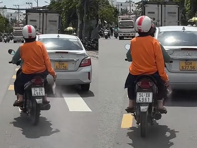 Người phụ nữ rải bột lạ trên đường ở TP.HCM: 'Chỉ là bột cà phê' - Ảnh 2.