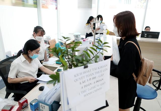 Nhiều đề xuất bỏ thuế suất 35% với người nộp thuế thu nhập cá nhân- Ảnh 1.