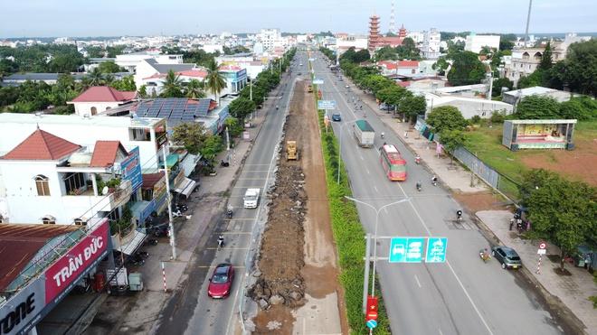 Quốc lộ 14 ở Đồng Nai vá mãi vẫn hư, như 'giăng bẫy' người đi đường- Ảnh 12.
