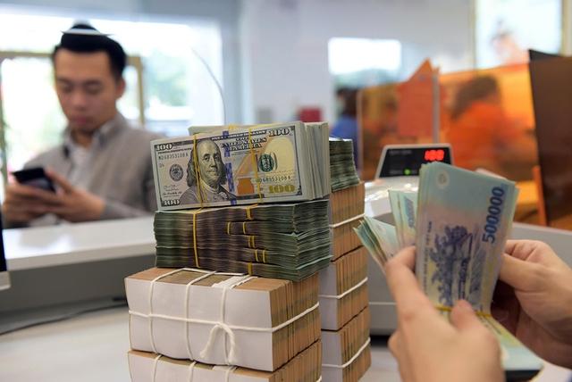 Lãi suất tiết kiệm âm thầm tăng- Ảnh 2.