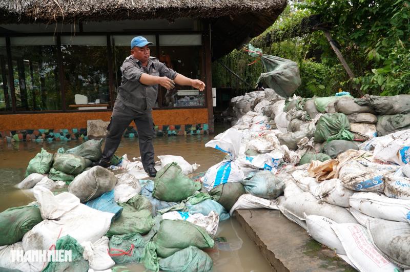 Ngập nước tại Thanh Đa và Bình Quới: Người dân khẩn trương ứng phó với triều cường - Ảnh 10.