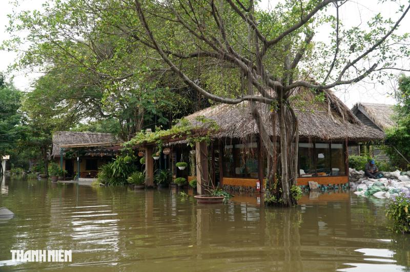 Ngập nước tại Thanh Đa và Bình Quới: Người dân khẩn trương ứng phó với triều cường - Ảnh 6.