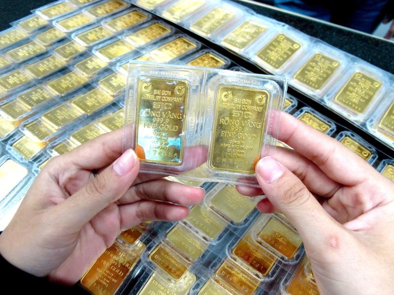 Vàng tăng kỷ lục, dự kiến thu thuế người bán vàng- Ảnh 1.
