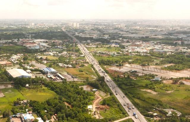 TP.HCM 'chốt' mở rộng quốc lộ 22 lên 10 làn xe, xây thêm 7 cầu vượt- Ảnh 1.