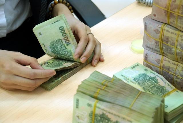 Thuế thu nhập cá nhân với tiền thưởng cuối năm, lương tháng 13 được tính thế nào?- Ảnh 1.