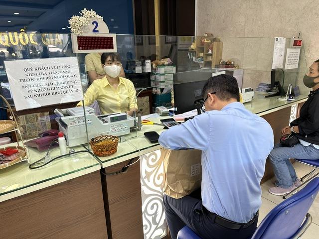 Công ty SJC tạm ngưng đăng ký mua vàng miếng trực tuyến- Ảnh 1.