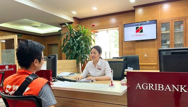 Agribank giảm lãi suất vay 2% cho khách hàng bị ảnh hưởng bão lũ - Ảnh 1.