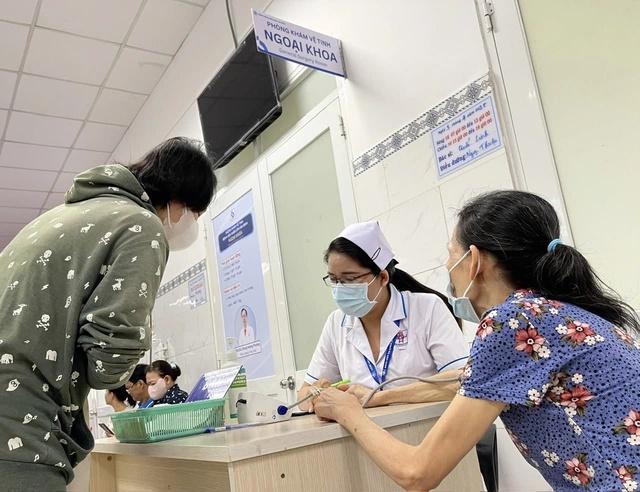 BHXH TP.HCM chấn chỉnh việc thu phí trái quy định khi vận động tham gia bảo hiểm- Ảnh 1.