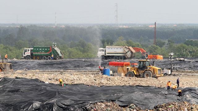 TP.HCM: Bãi rác Đa Phước chỉ nhận ban đêm, 4.550 tấn/ngày có nguy cơ ùn ứ? - Ảnh 1.