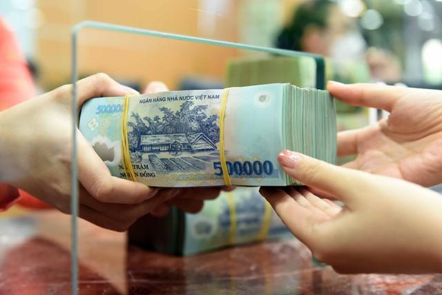 Yêu cầu các ngân hàng phục vụ tốt nhu cầu thanh toán dịp cuối năm- Ảnh 1.