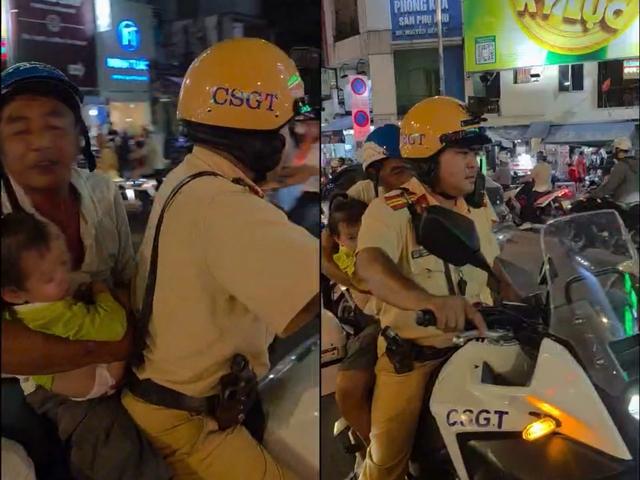 Xúc động hình ảnh CSGT Chợ Lớn mở đường giữa giờ cao điểm cứu bé gái - Ảnh 1.