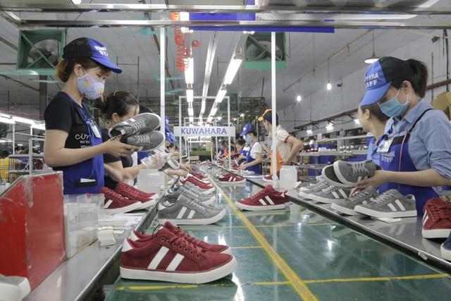 Hai cá nhân chi gần 1.400 tỉ đồng mua cổ phiếu Giầy Thượng Đình - Ảnh 1.