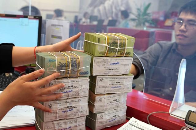 Ngân hàng cho vay năm 2025 tăng hơn 19%, dư nợ 18,58 triệu tỉ đồng- Ảnh 1.