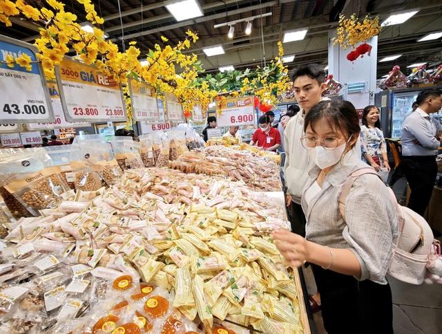 Thưởng tết nhiều hơn nhờ giảm thuế- Ảnh 1.