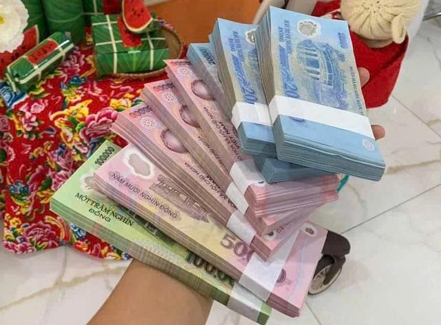 Vào mùa đổi tiền mới lì xì, cần cẩn trọng để không… phạm luật- Ảnh 2.