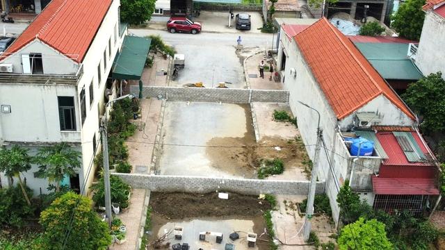 Vụ xây tường chắn ngang đường ở Nga Sơn: Đồng ý đền bù đất cho dân - Ảnh 1.