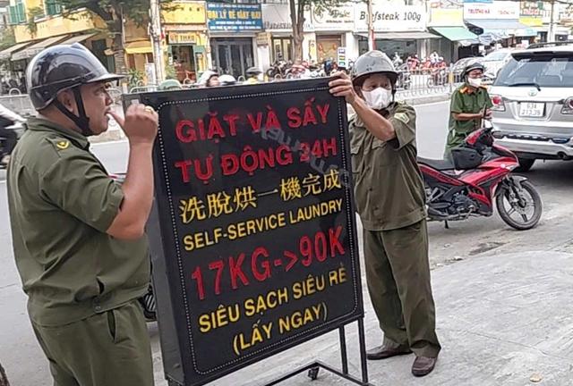 TP.HCM: Xử lý kiên quyết vi phạm vỉa hè, lòng đường ở nhiều tuyến phố- Ảnh 2.