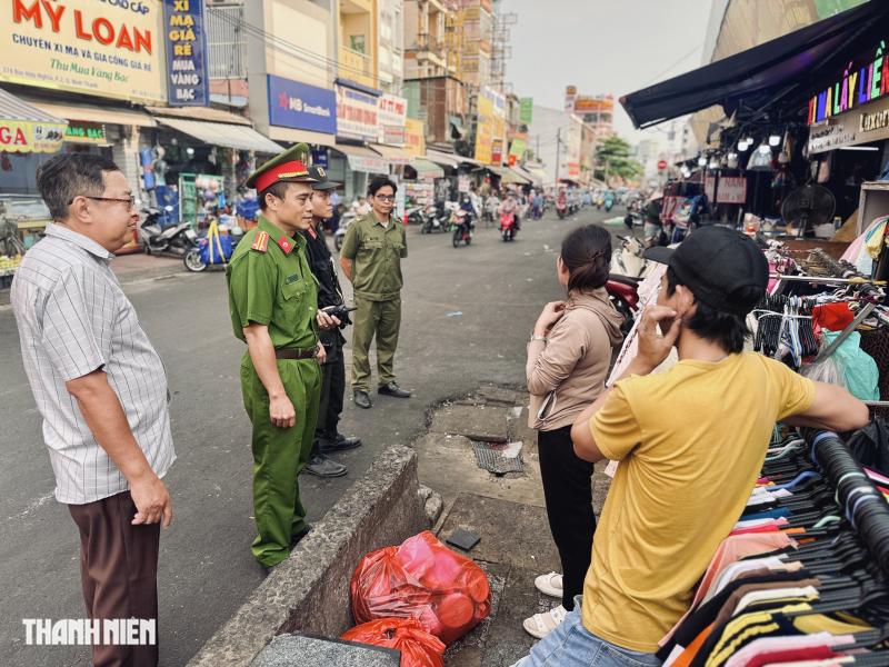 TP.HCM xử lý lấn chiếm vỉa hè: Chợ Bà Chiểu 'lột xác', người dân ngạc nhiên - Ảnh 2.