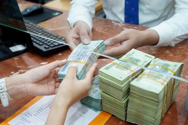 Nhận thưởng Tết Bính Ngọ 2026 bằng vàng, voucher phải nộp thuế ra sao?- Ảnh 2.