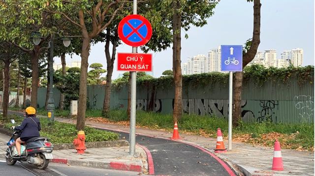 Xe máy đi vào làn ưu tiên xe đạp ở TP.HCM có bị CSGT xử phạt? - Ảnh 4.