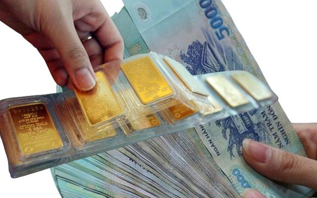 SJC tạm ngưng mua, bán vàng miếng, vàng nhẫn sáng 31.1 - Ảnh 1.
