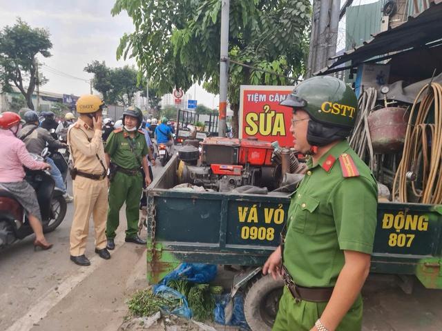 TP.HCM 'dẹp loạn' lấn chiếm lòng lề đường- Ảnh 6.