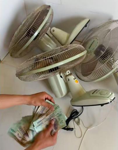 Dọn nhà đón tết, gia đình phát hiện gần 40 triệu được nhét trong 3 chiếc quạt  - Ảnh 2.