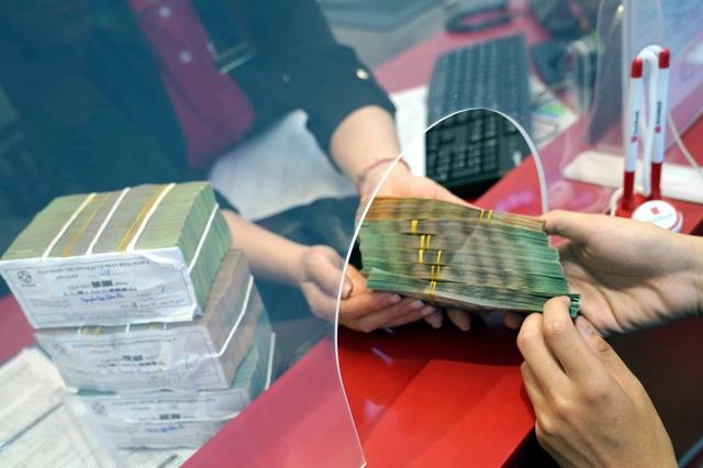 Gửi tiền ở ngân hàng nào lãi cao nhất?- Ảnh 1.