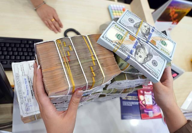 Giá USD hôm nay 18.4.2026: - Ảnh 1.