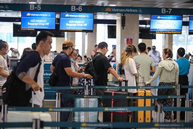 Sân bay Tân Sơn Nhất tăng tần suất lên 46 chuyến bay/giờ cao điểm lễ 30.4- Ảnh 1.