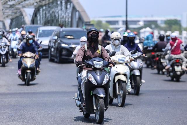 Nam bộ sắp vào mùa mưa, miền Bắc và miền Trung chuẩn bị đón nắng nóng- Ảnh 2.