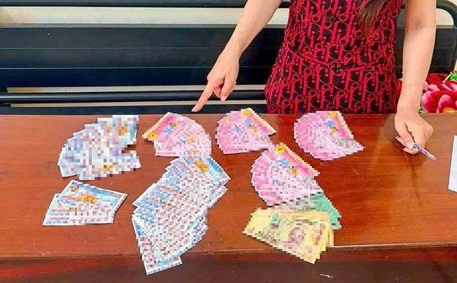Bắt kẻ dàn cảnh cướp giật vé số, chiếm đoạt 352 tờ của người bán dạo - Ảnh 2.