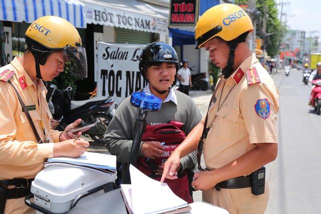 2 tháng, 357 trường ở TP.HCM có học sinh vi phạm luật an toàn giao thông - Ảnh 1.