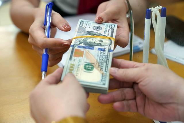 Giá USD hôm nay 26.5.2026: Ngân hàng tăng, thị trường tự do sụt giảm- Ảnh 1.