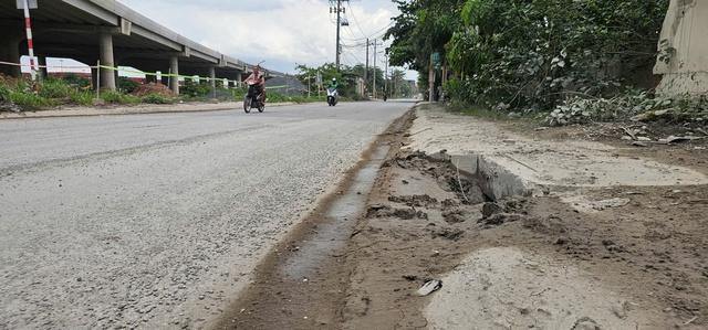 Đường Nguyễn Xiển xuống cấp, người dân bất an vì bẫy 'ổ gà, ổ voi' - Ảnh 5.